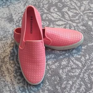 Women's pink Under Armour slip ons